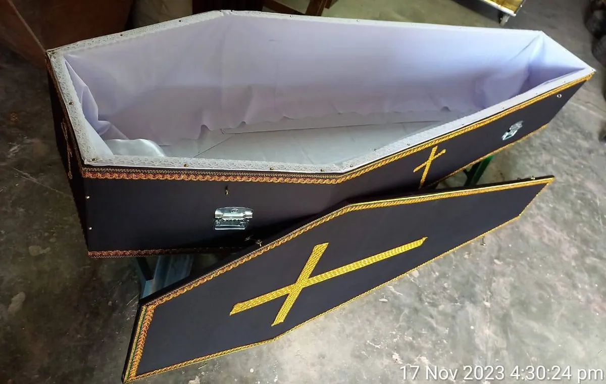Coffin interior lined with white satin ready for presentation