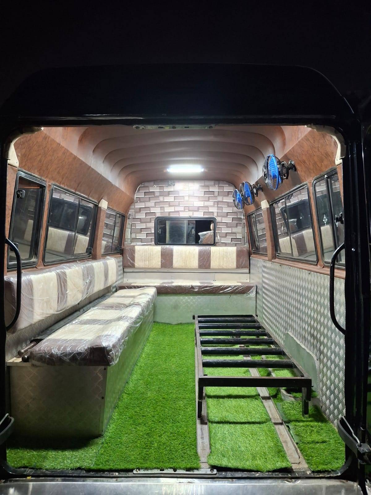 Hearse van interior with seating and coffin platform