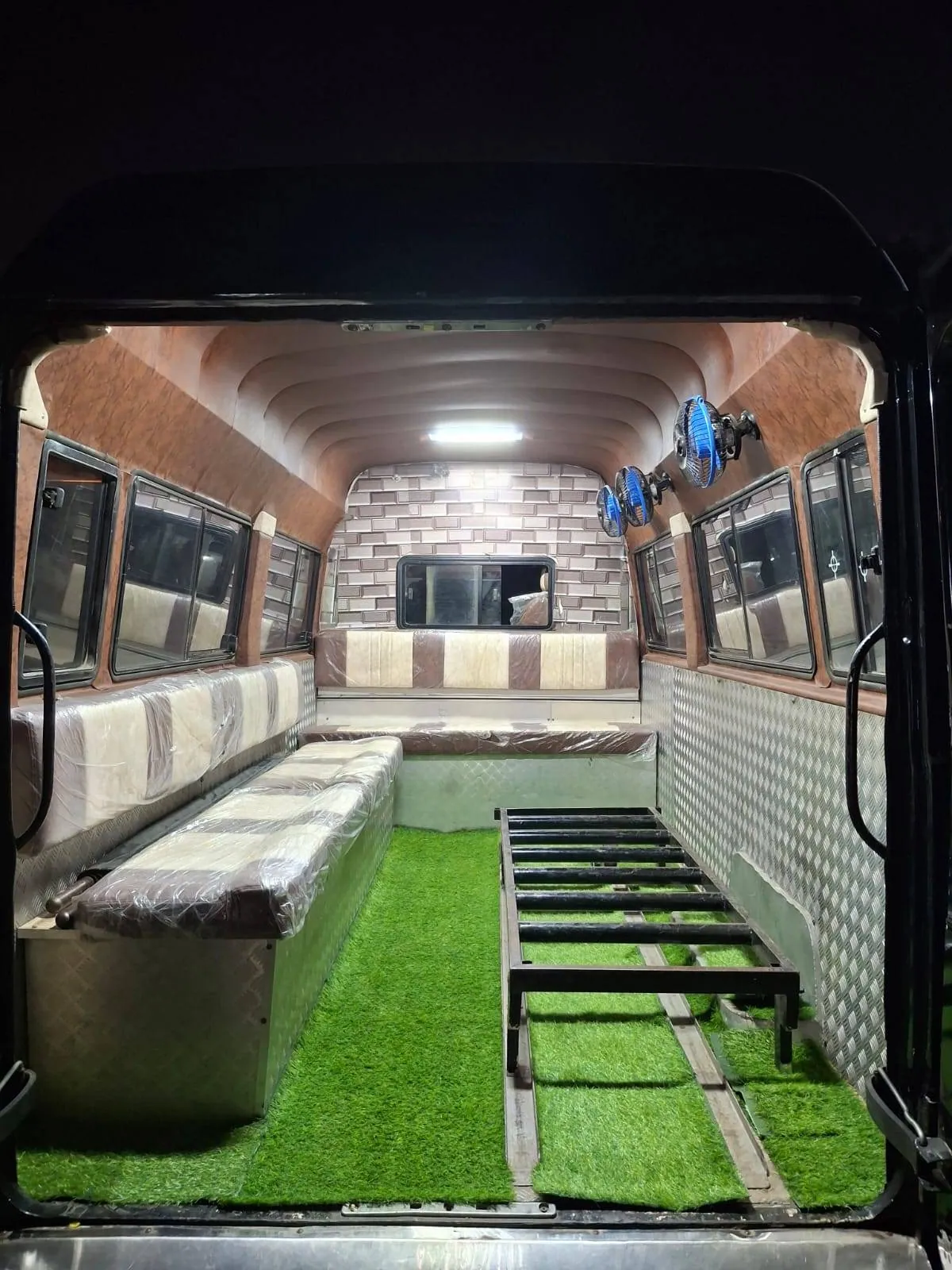 Hearse van interior with seating and coffin platform